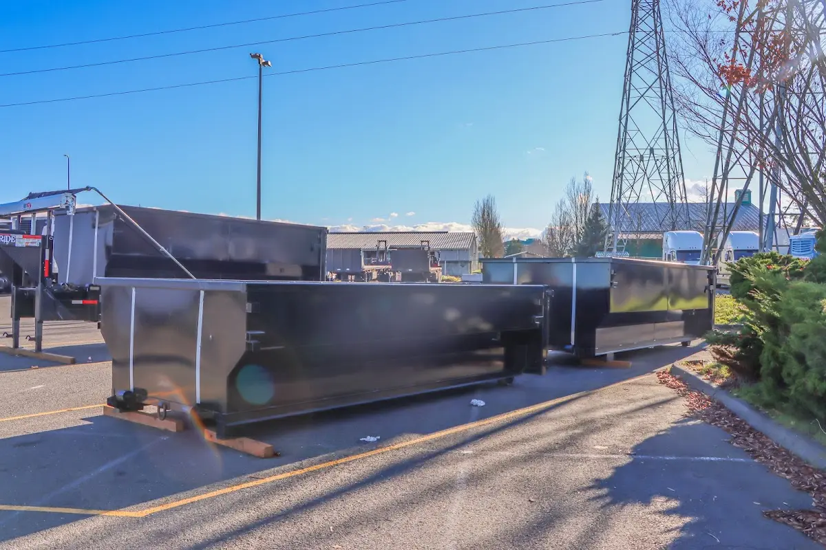 Roll-off dumpster ready for waste disposal at job site for Residential Dumpster Rental in Pine